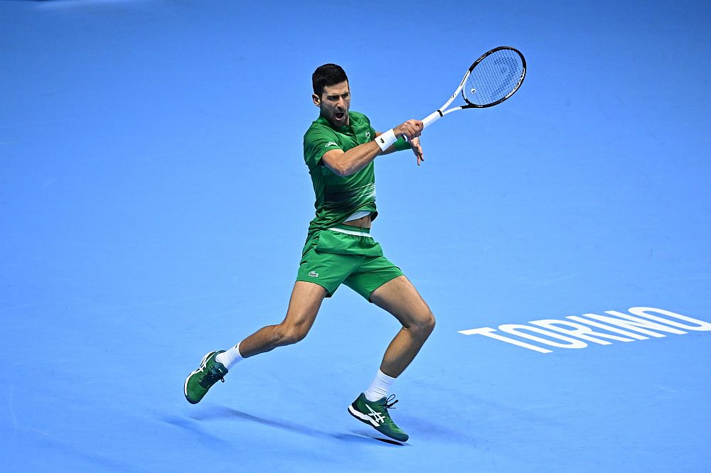 Djokovic fights virus to win in Paris; exhausted Sinner slams